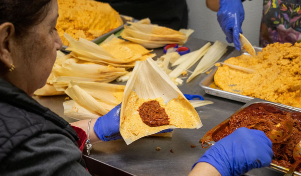 Woman making tamales